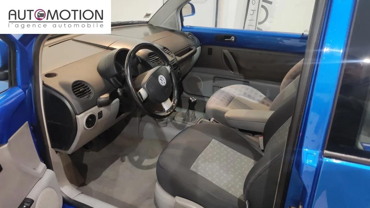Volkswagen New Beetle - Photo 11