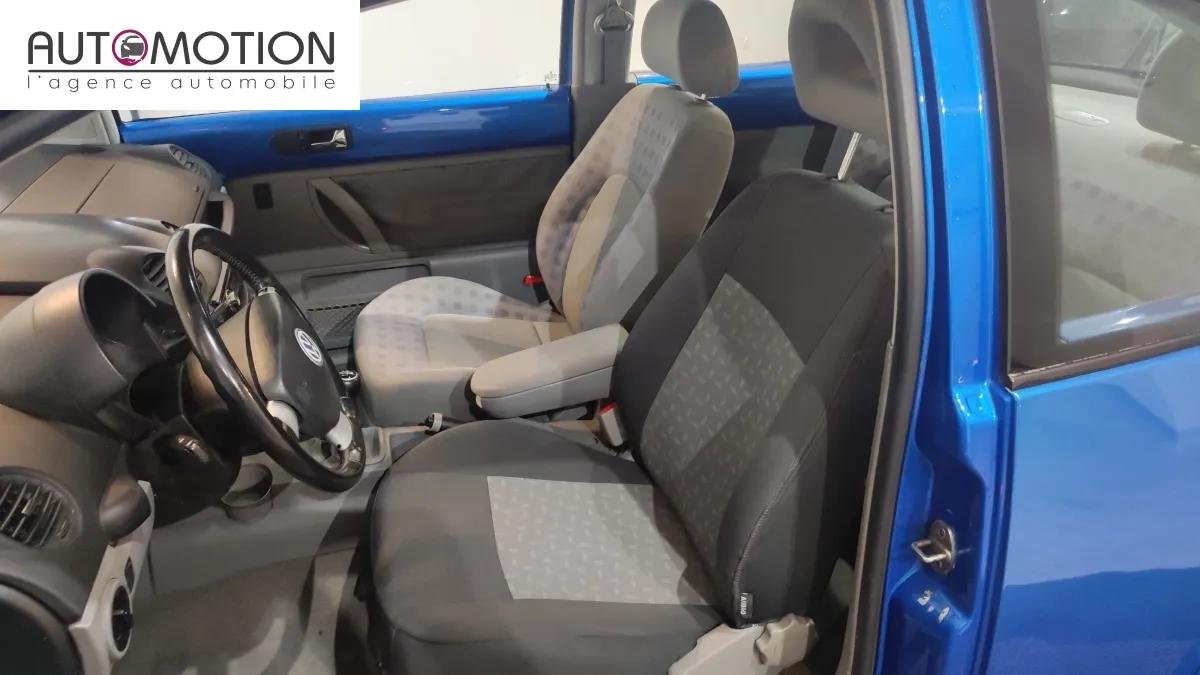 Volkswagen New Beetle - Photo 12
