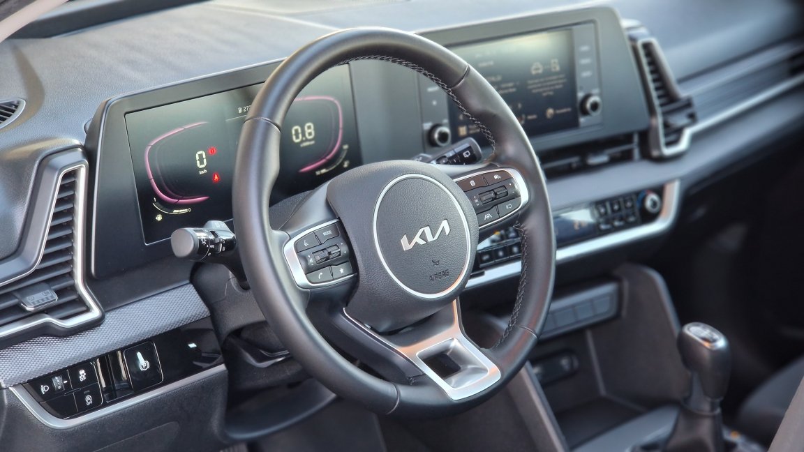 Kia Sportage - Photo 30