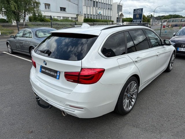 BMW Série 3 - Photo 4