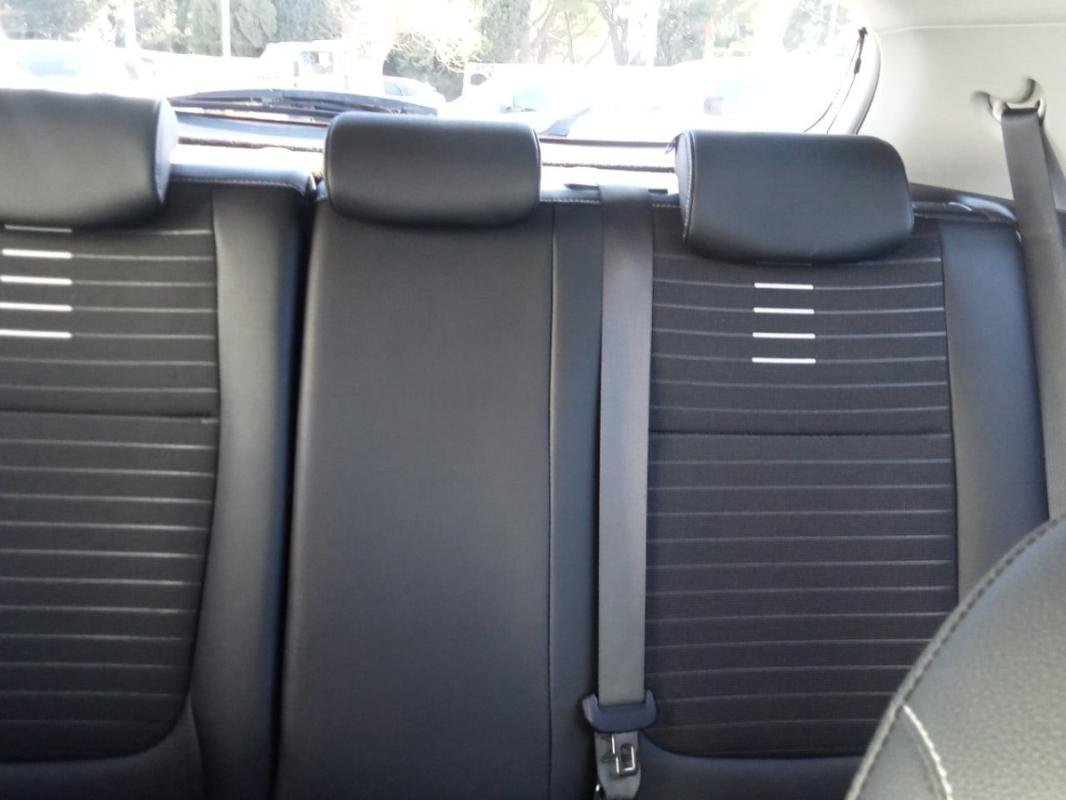 Kia Rio - Photo 28